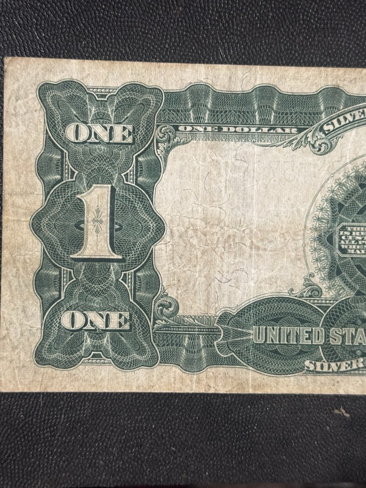 This is an 1899 $1 Silver Certificate, also known as the "Black Eagle" note.