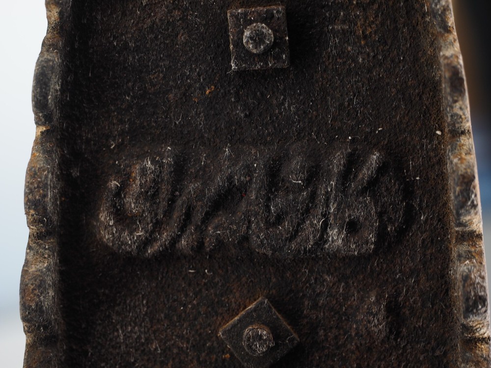 Antique cast iron coal fired clothing iron