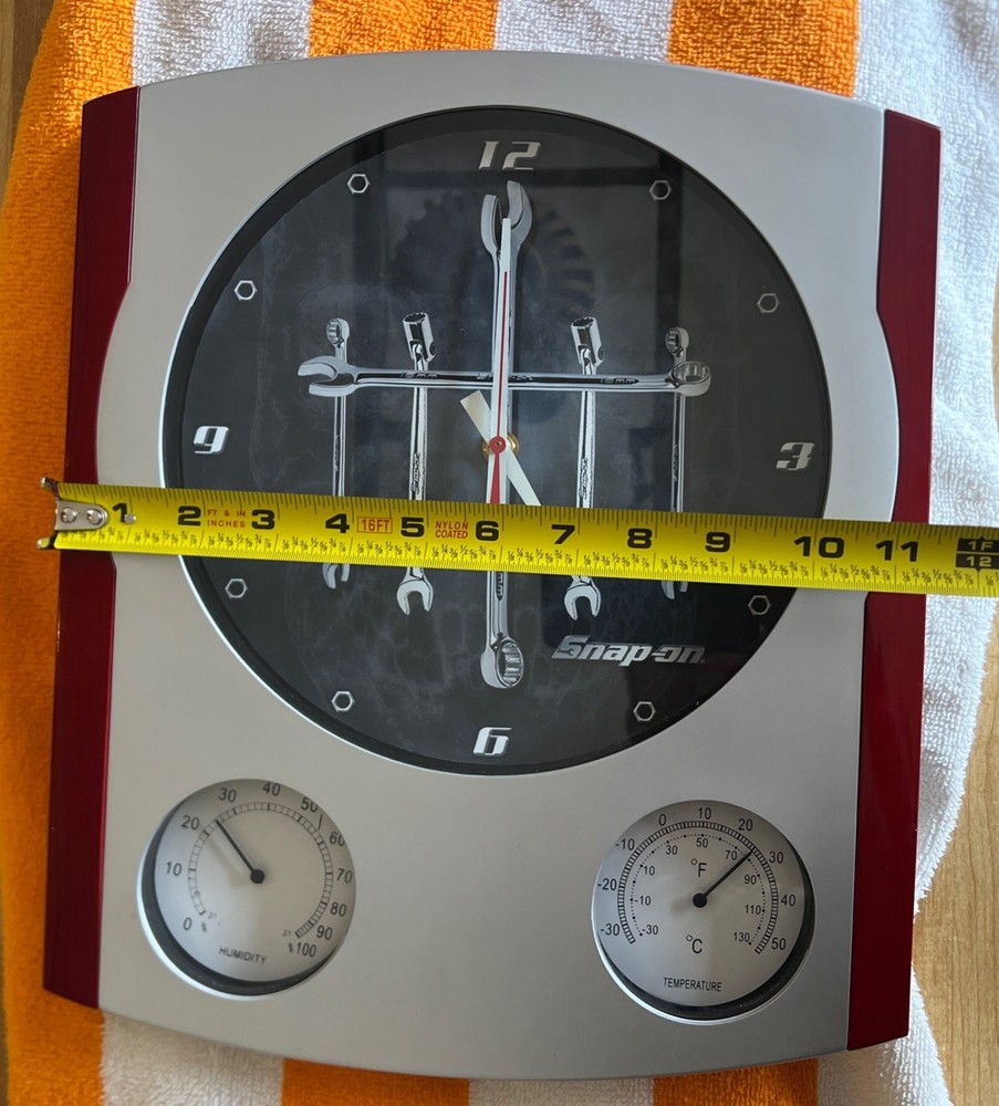 “Snap-on wall clock thermometer hygrometer