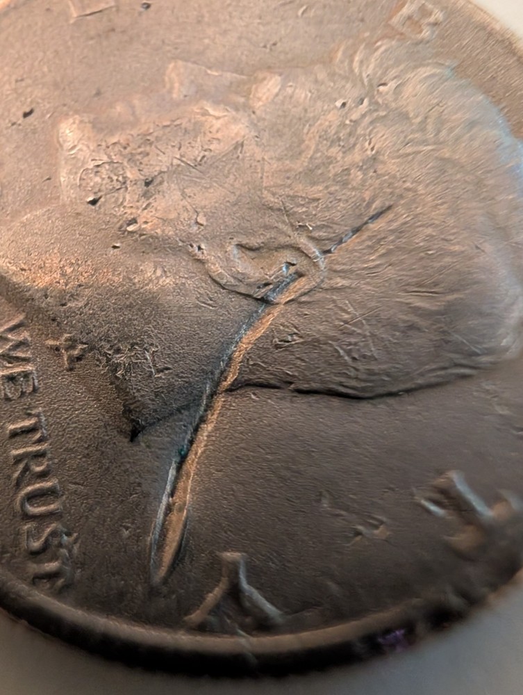 1971 Half Dollar Struck Through Wire And Error On His Cheek