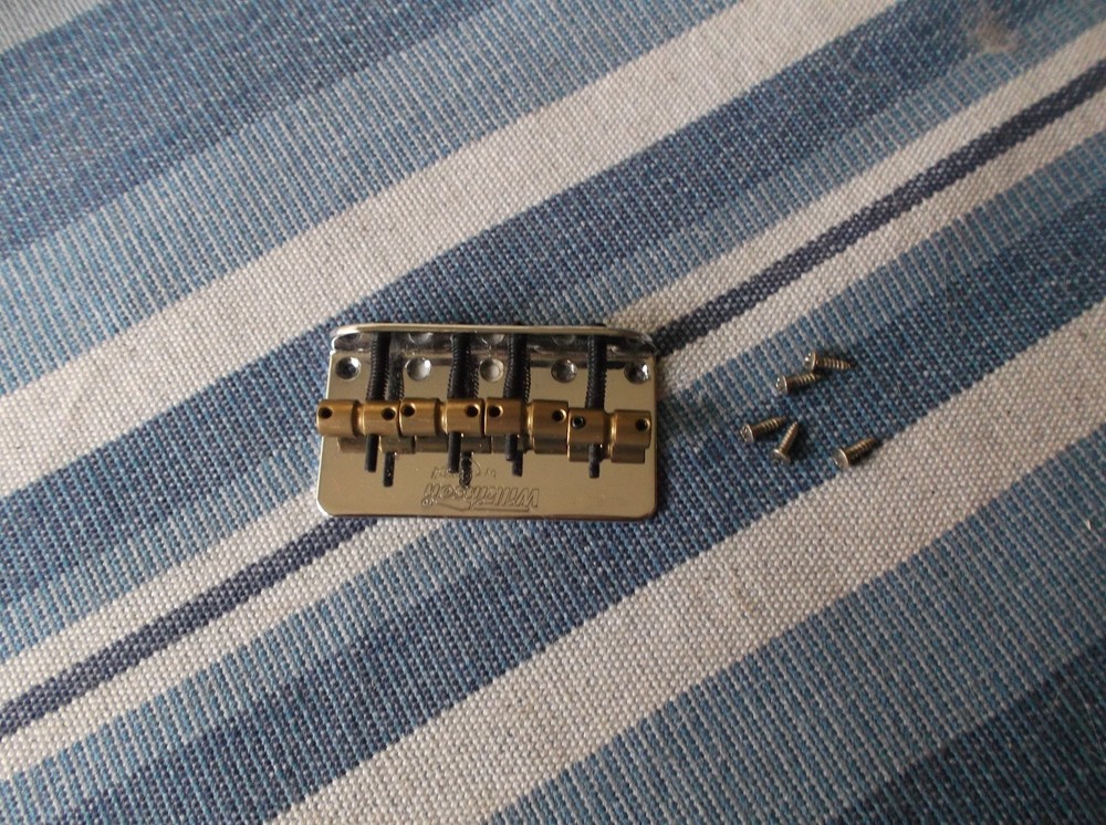 Wilkinson  4 strings bass bridge ( used)