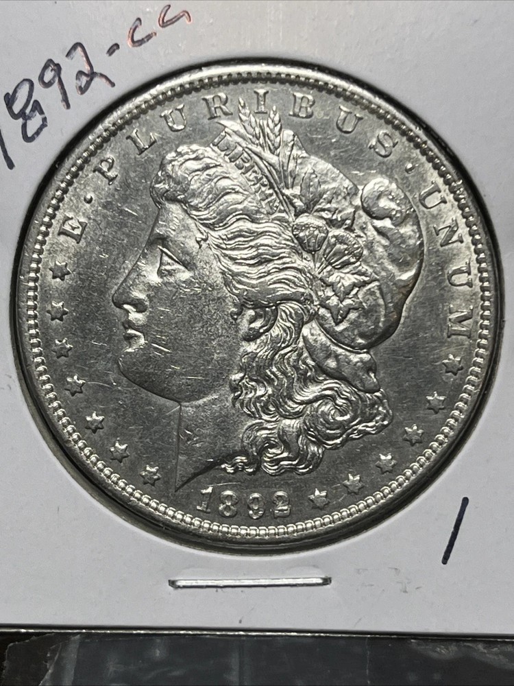 1892-CC MORGAN SILVER DOLLAR, AU DETAILS
