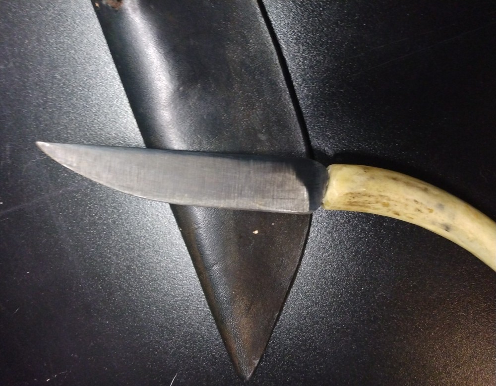 Unique handmade 8" knife in leather sheath