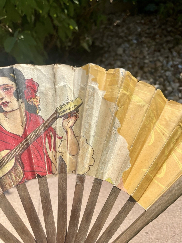 vintage advertising hand fan