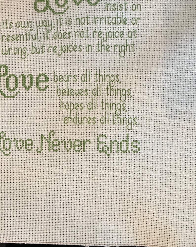 Love Never Ends Cross Stitch Sampler Unframed