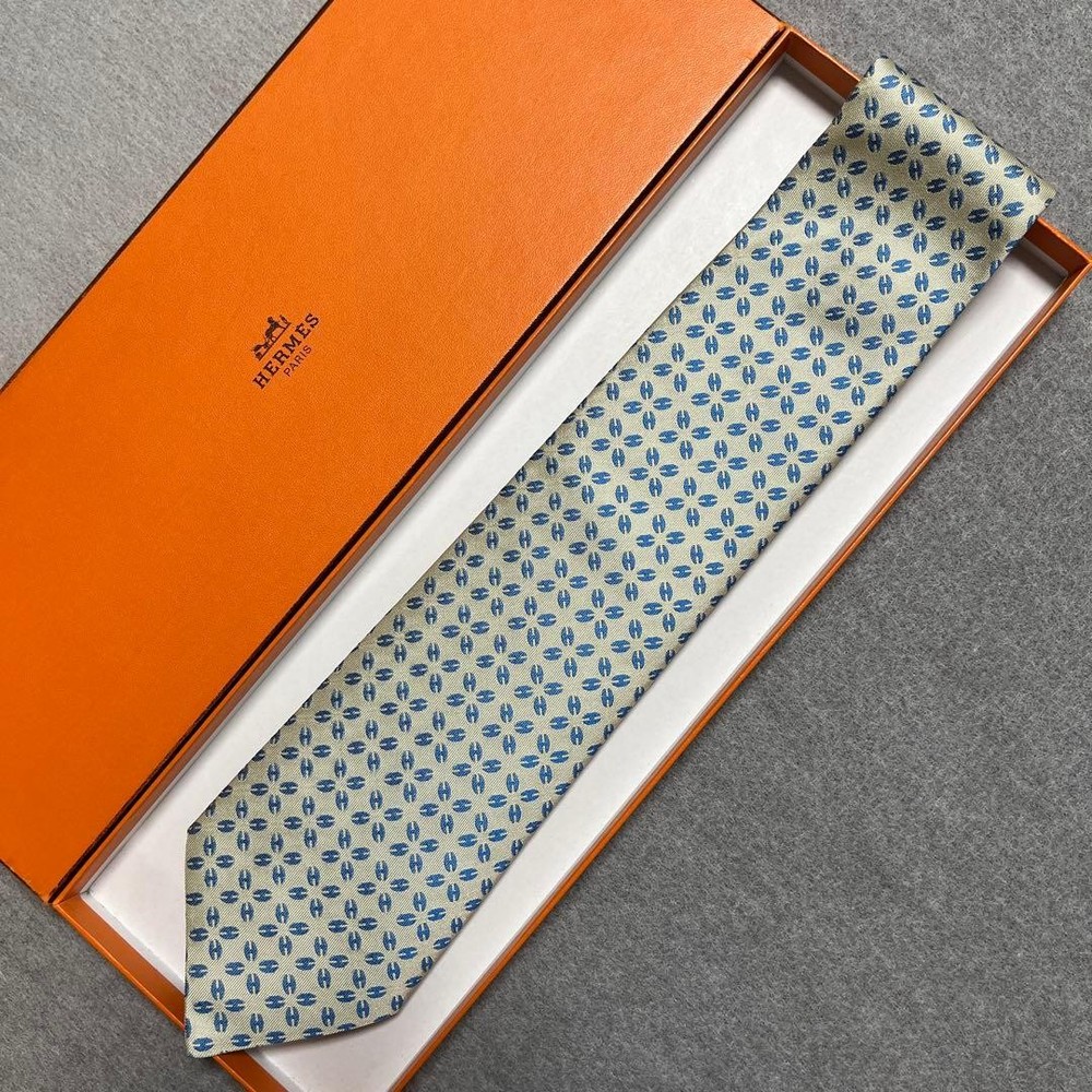 HERMES tie blue and white H pattern silk jacquard