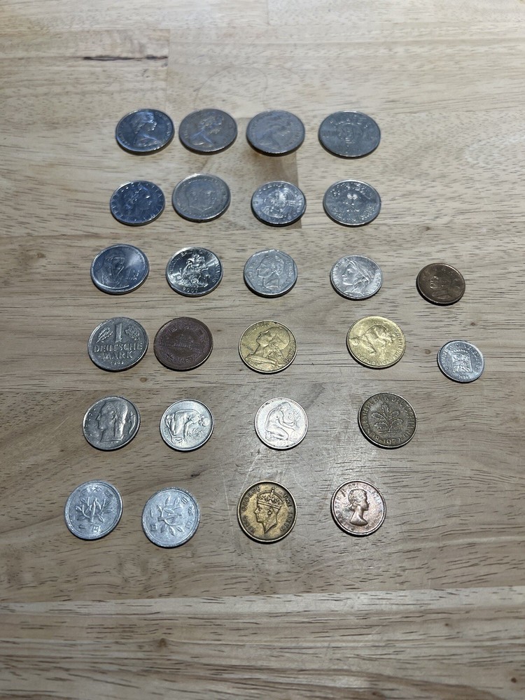 Assorted foreign coins. 26 Coins In Total