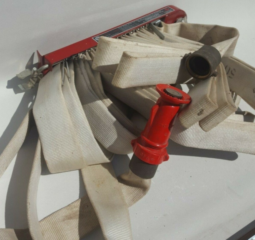 F-M Fireman Hose Rack with Fire Hose.