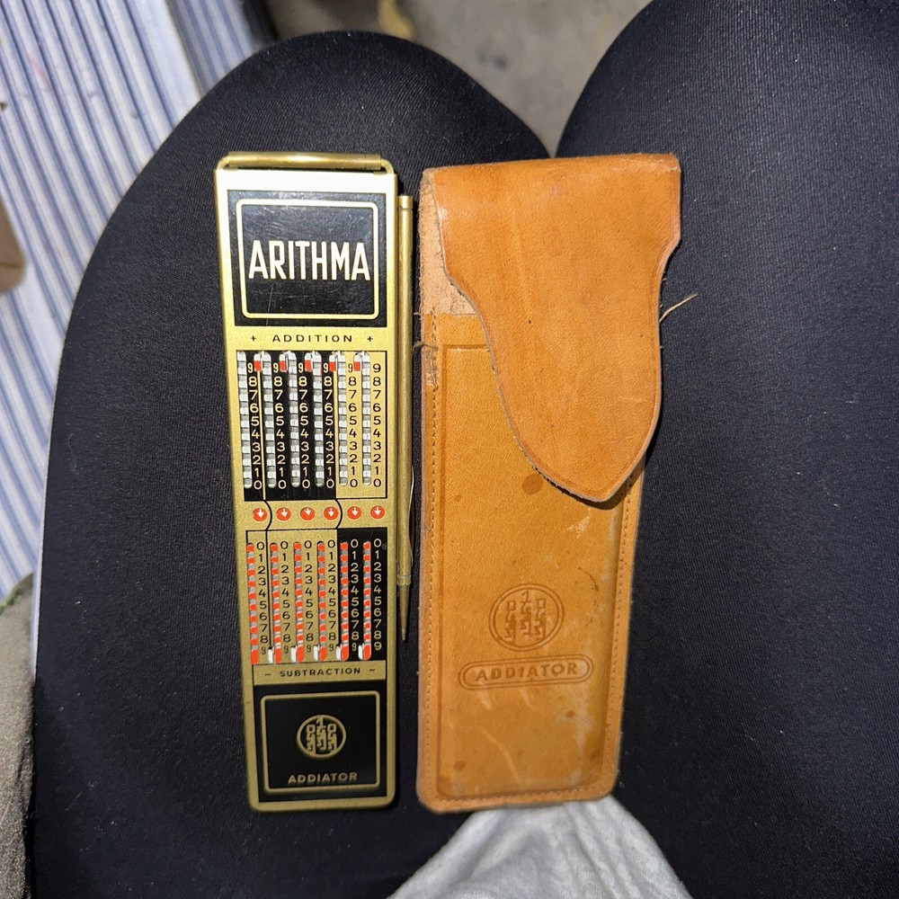 Addiator worlds smallest precision adding machine