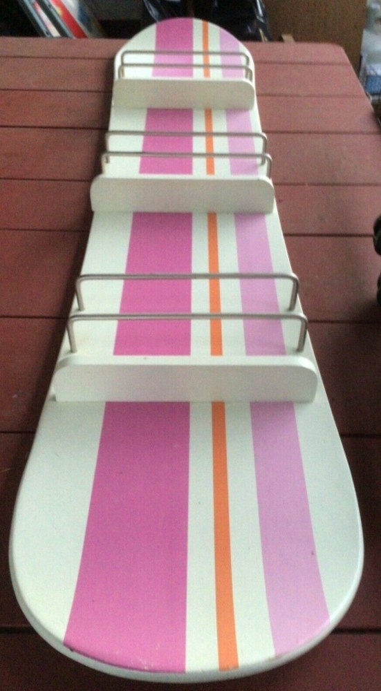 COMIC BOOK OR MAGAZINE RACK SNOWBOARD DESIGN