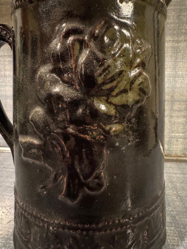 Antique Ceramic Pitcher with raised floral pattern