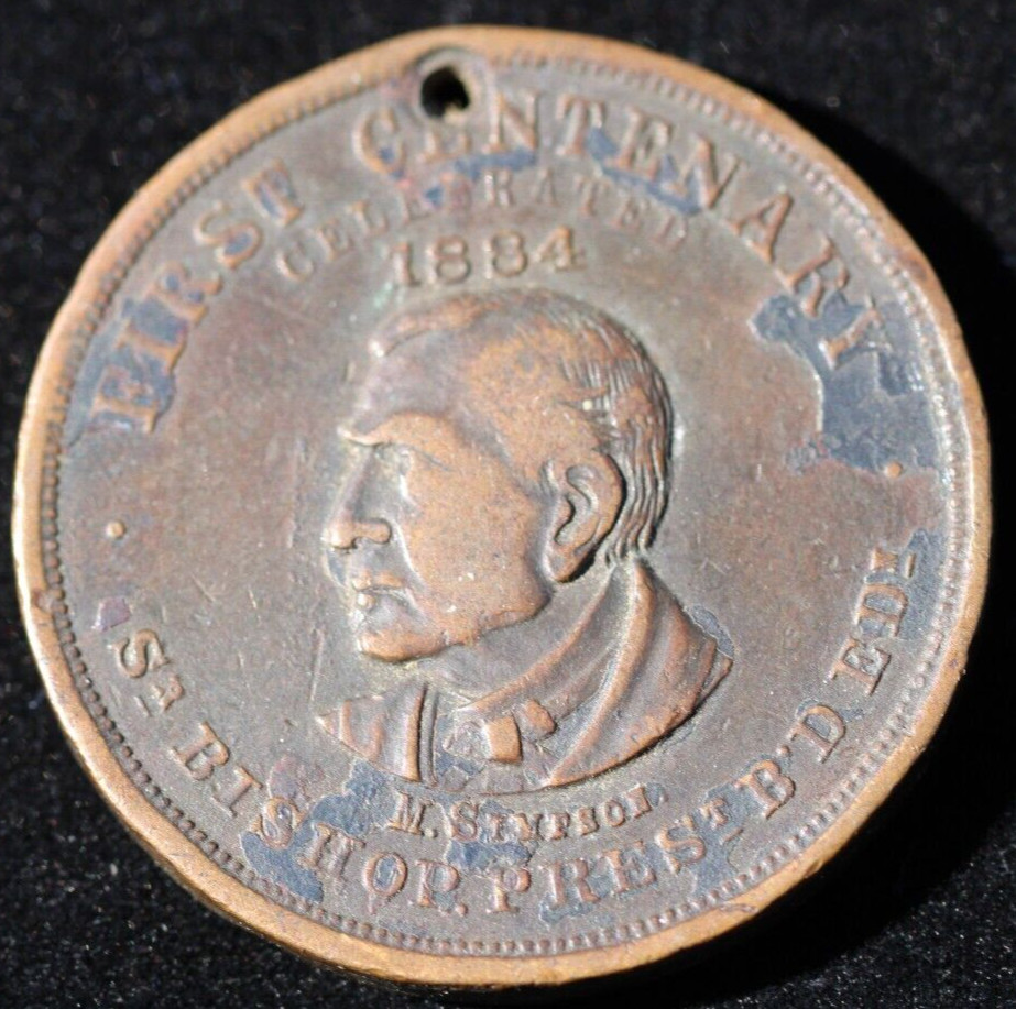 Unknown 1884 Church token Holed