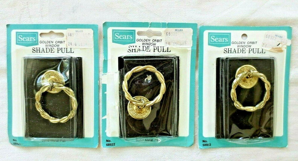 THREE GOLDEN ORBIT WINDOW SHADE PULLS (NEW)