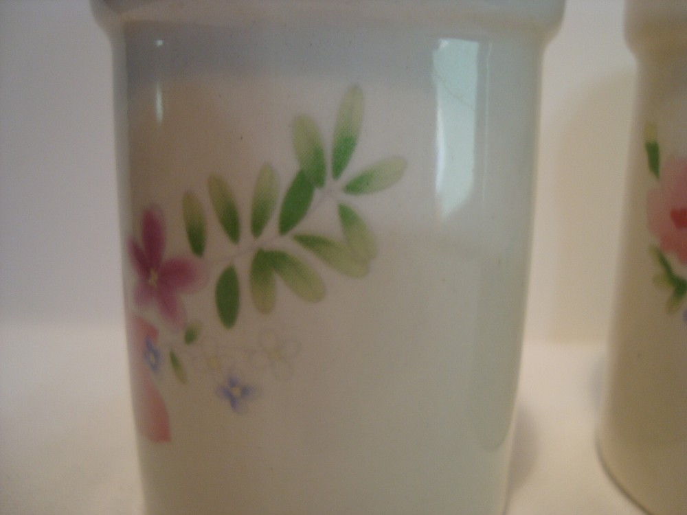 Large white porcelain floral pattern salt & pepper shaker set.