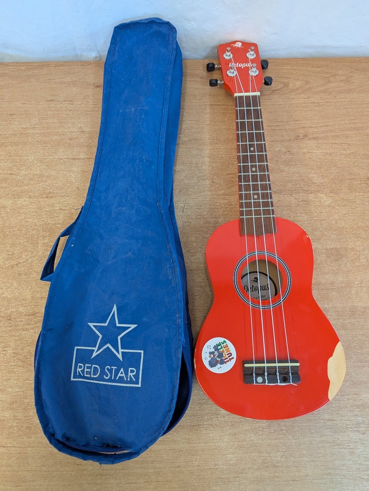 Octopus Soprano Ukulele Red with 4 Strings Includes Case for Beginners