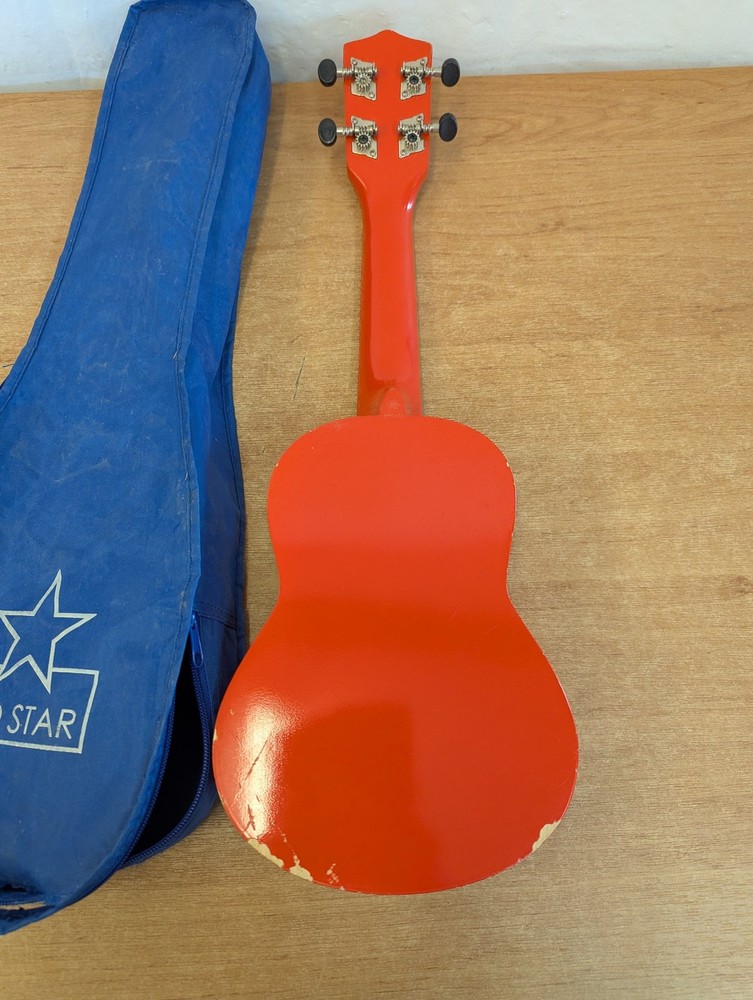 Octopus Soprano Ukulele Red with 4 Strings Includes Case for Beginners