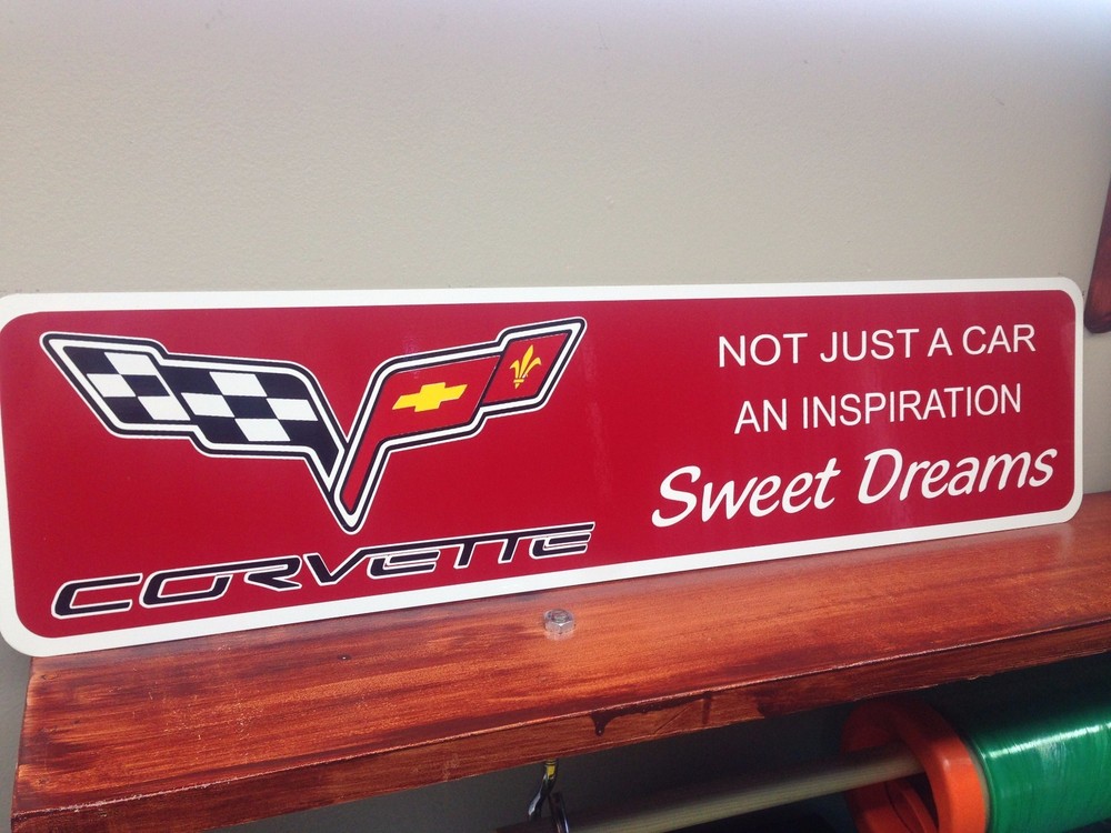 Red Corvette metal sign 6" x 24"