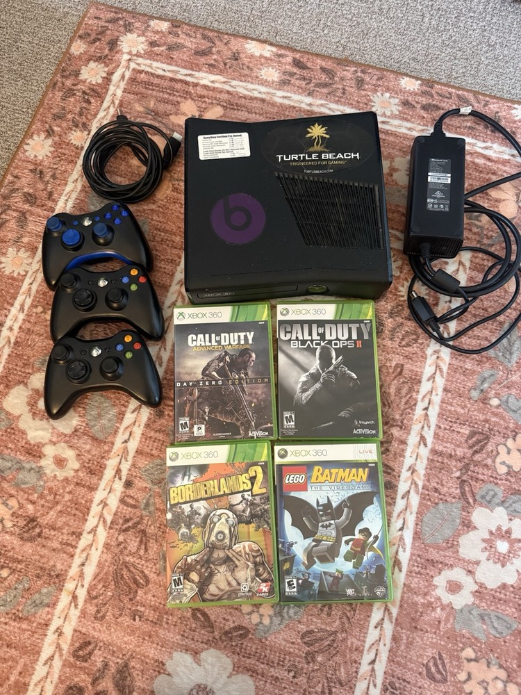 Xbox 360- Includes 4 Games 3 Controllers