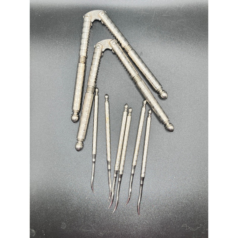 Vintage Ornate Metal Nutcracker Pick Set Elegant Silverware Kitchen Gadget