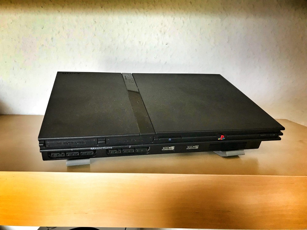 Universal game console stand display