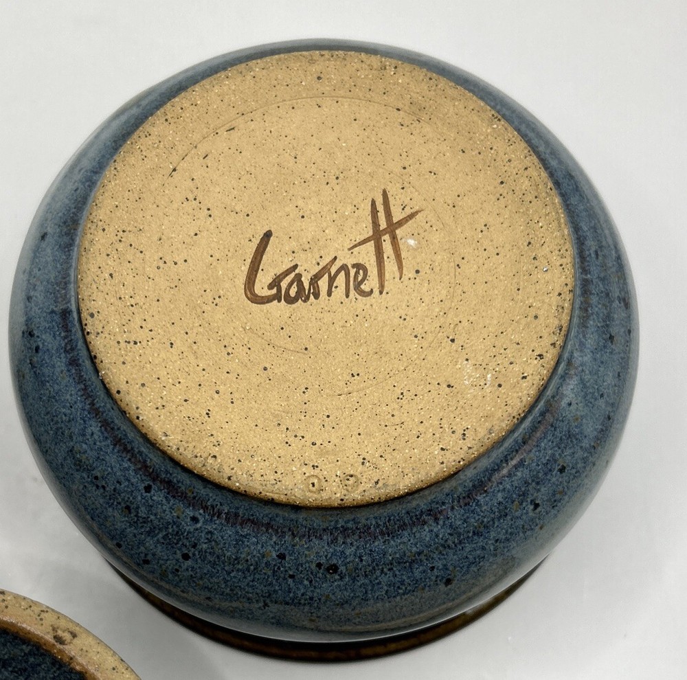 Pottery canisters set of 2 Signed Garnett