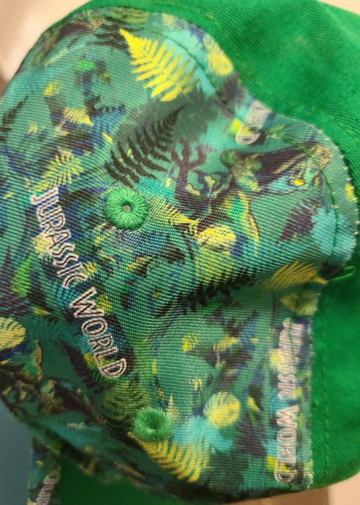 JURASSIC WORLD GREEN W/CAMO HATE MISSING ORIGINAL TAG