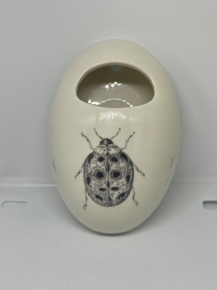 Small wall vase by Daphne B