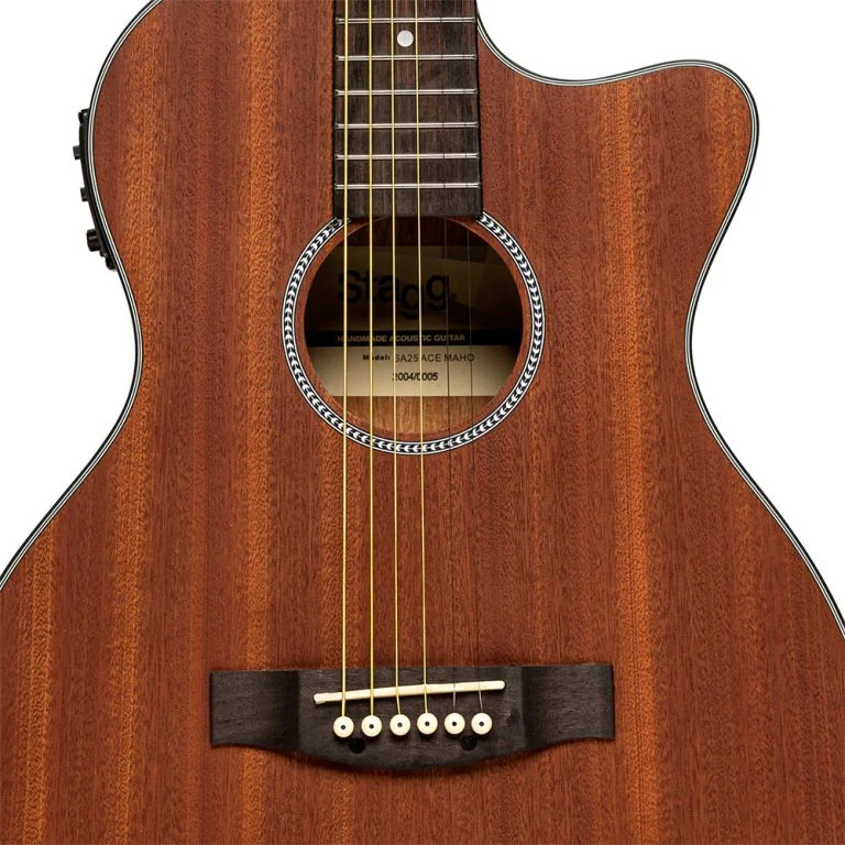 Electro-acoustic auditorium guitar with cutaway