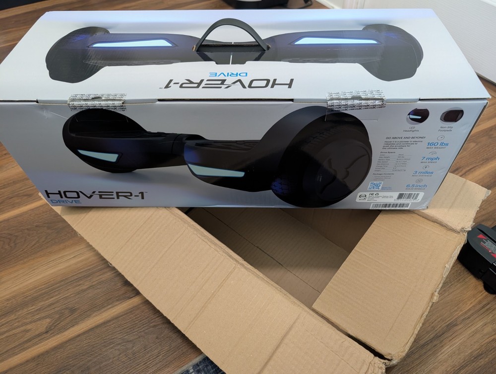 Hover-1 Drive Electric Hoverboard, 7MPH, 3 Mile Range, LED Lights, Black