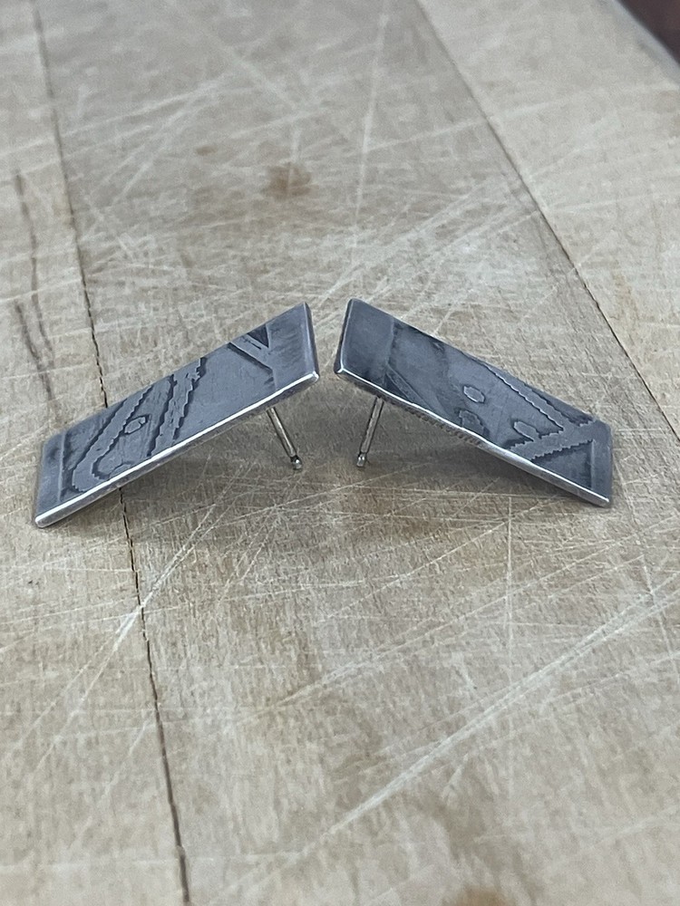 Handcrafted sterling silver studs featuring oxidized Southwestern Style Native