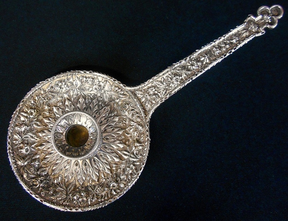 A rare repousse solid silver chamberstick, 11oz mark, S.Kirk & Son c.1886-96