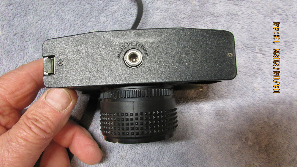 3 vintage cameras.