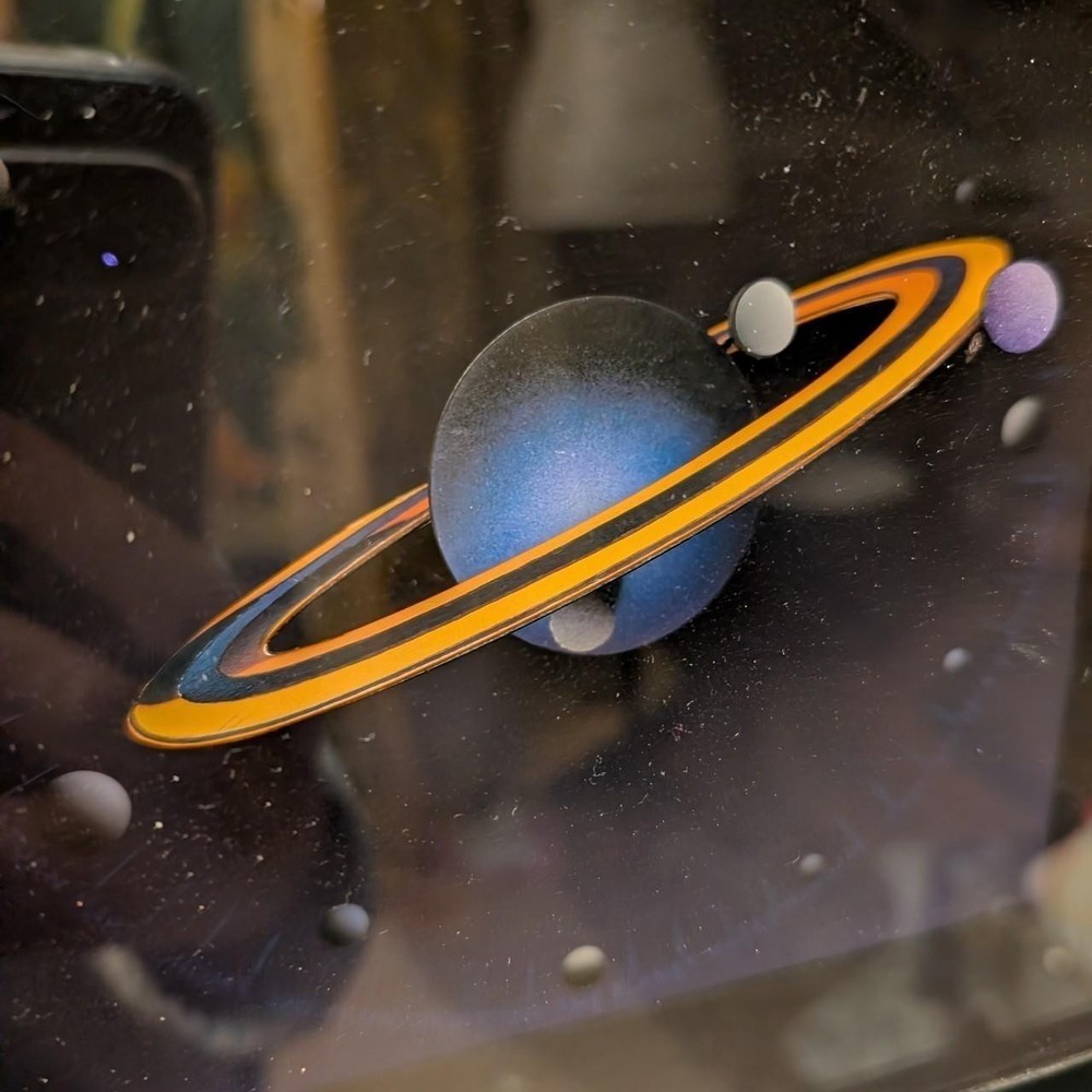 Clever Clocks Saturn clock Douglas Chalk medium