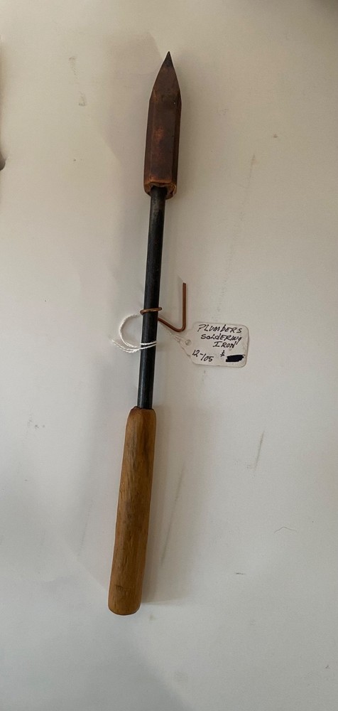 Collection of vintage blacksmithing and farrier tools