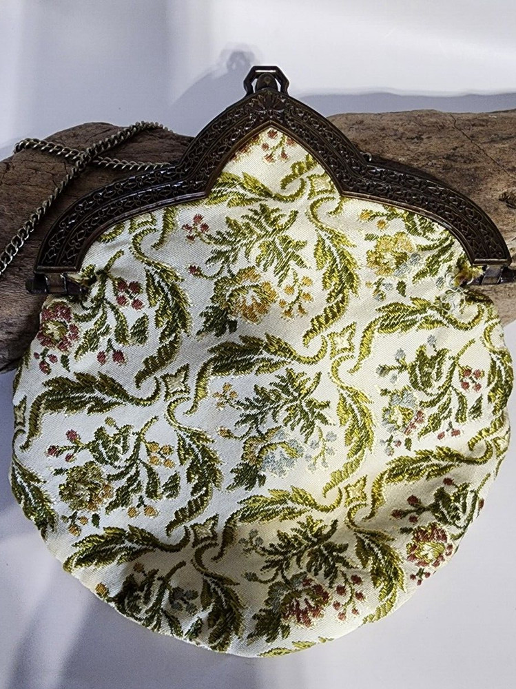 Antique round satin-lined embroidered purse, copper collar