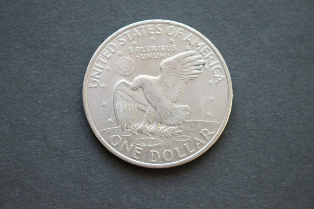 1971 D Eisenhower dollar/about uncirculated/doubled rim and edge error