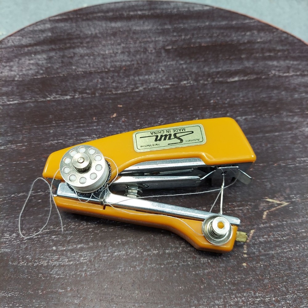 Sun Automatic Handheld Sewing Machine Portable & Compact Design For Quick Repair