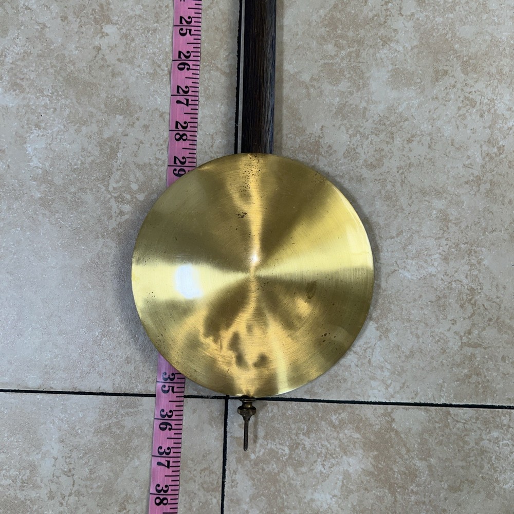 Junghans vintage grandfather clock pendulum.