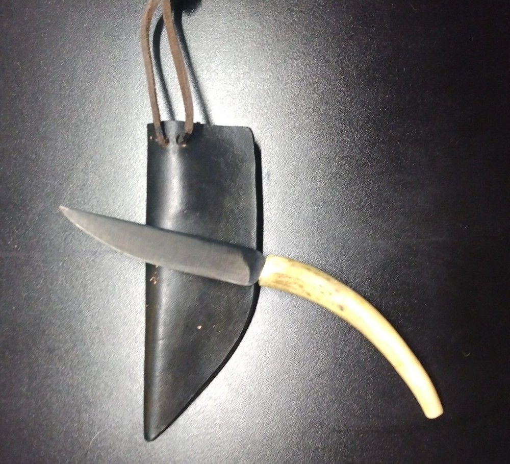 Unique handmade 8" knife in leather sheath