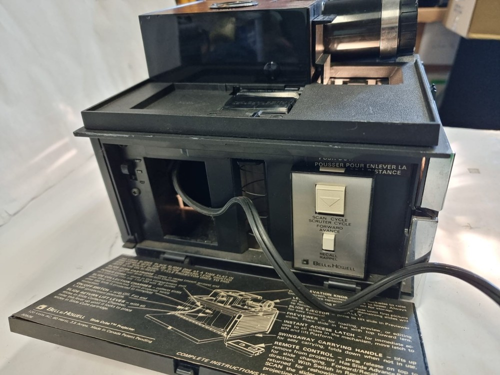 Vintage Bell & Howell Model 851ss Slide cube projector / Please read