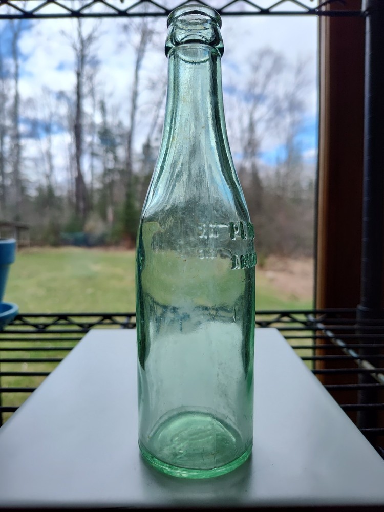 Vintage Pluto Water Bottle America’s Physic Devil Embossed Green
