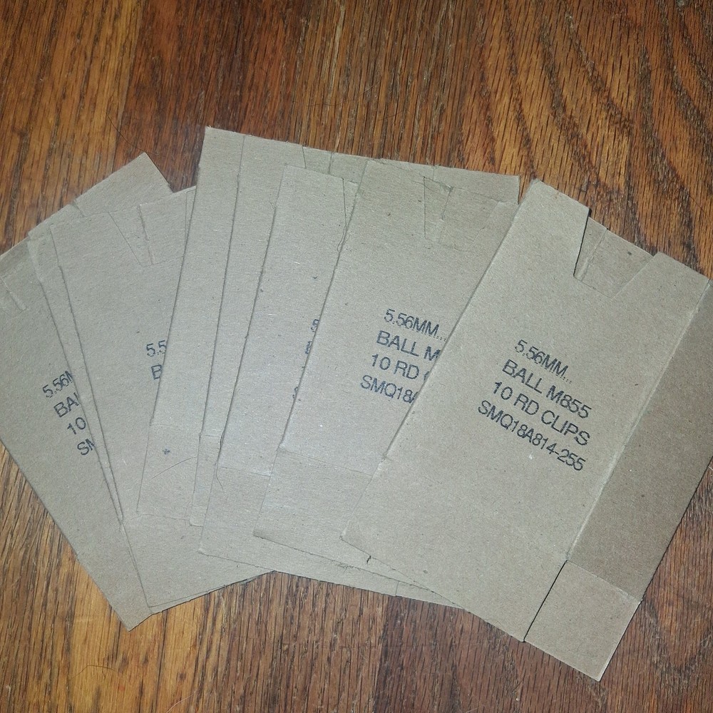 142 USGI stripper clips, 3 spoons, 9 sleeves