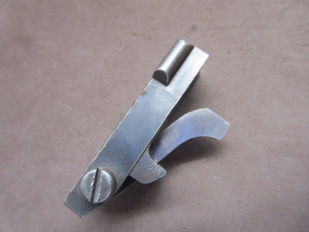 Mauser bolt release assembly with ejector and screw