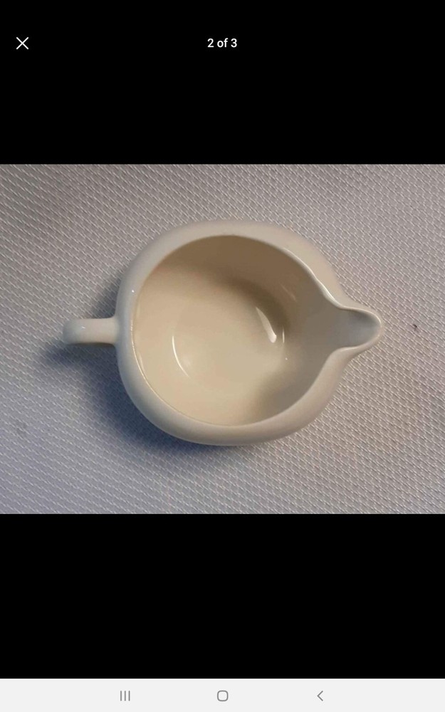 Cranberry ceramic creamer