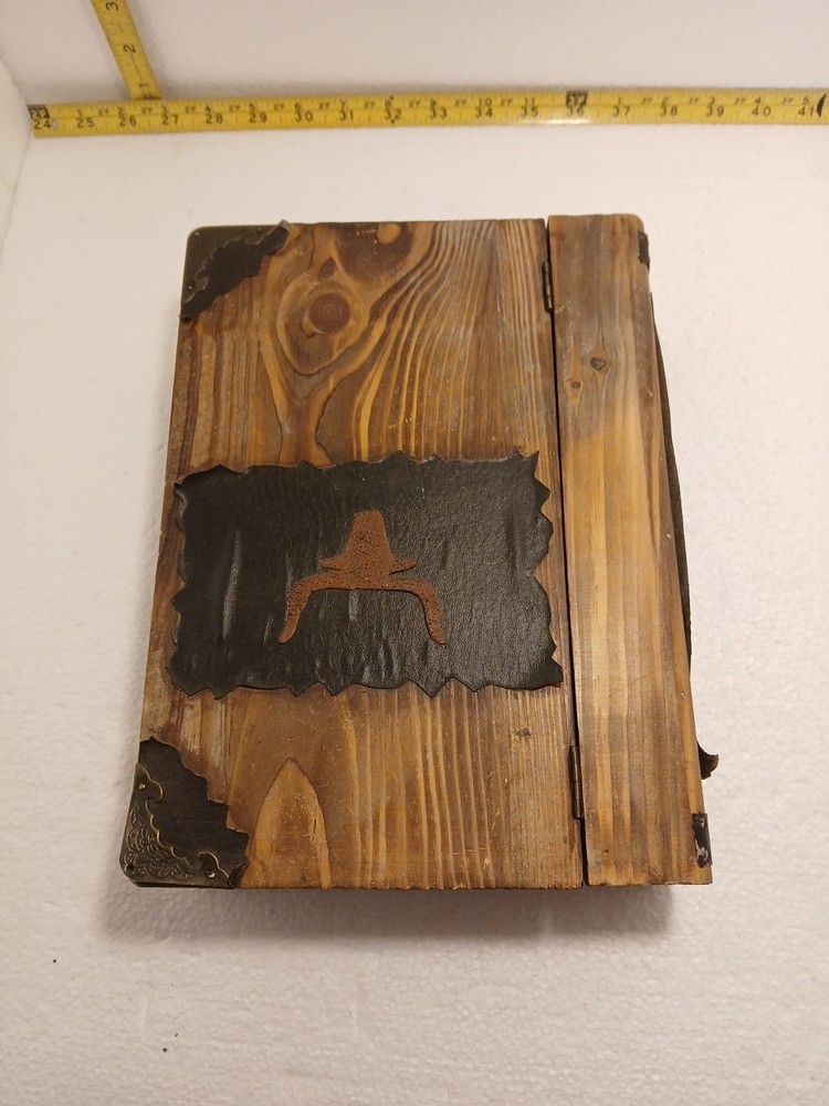 small wooden box with hinged lid