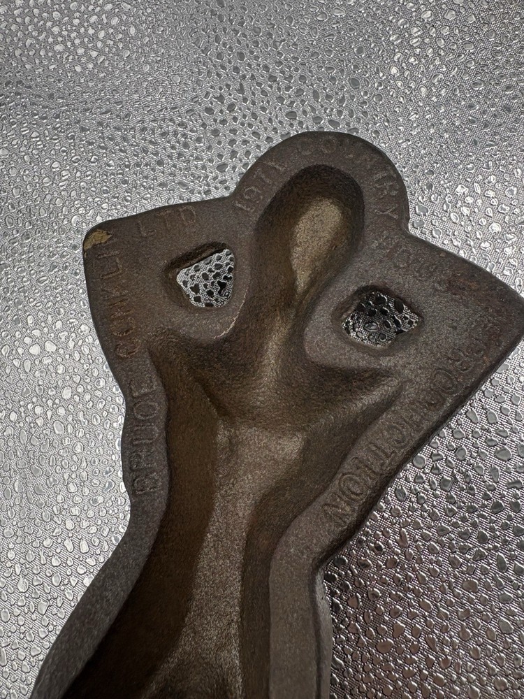 "Naughty Nellie" cast iron boot jack