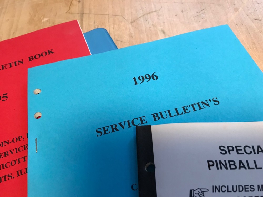 Capcom Service Bulletins Binder with Arcade Pinball game manuals, service, notes