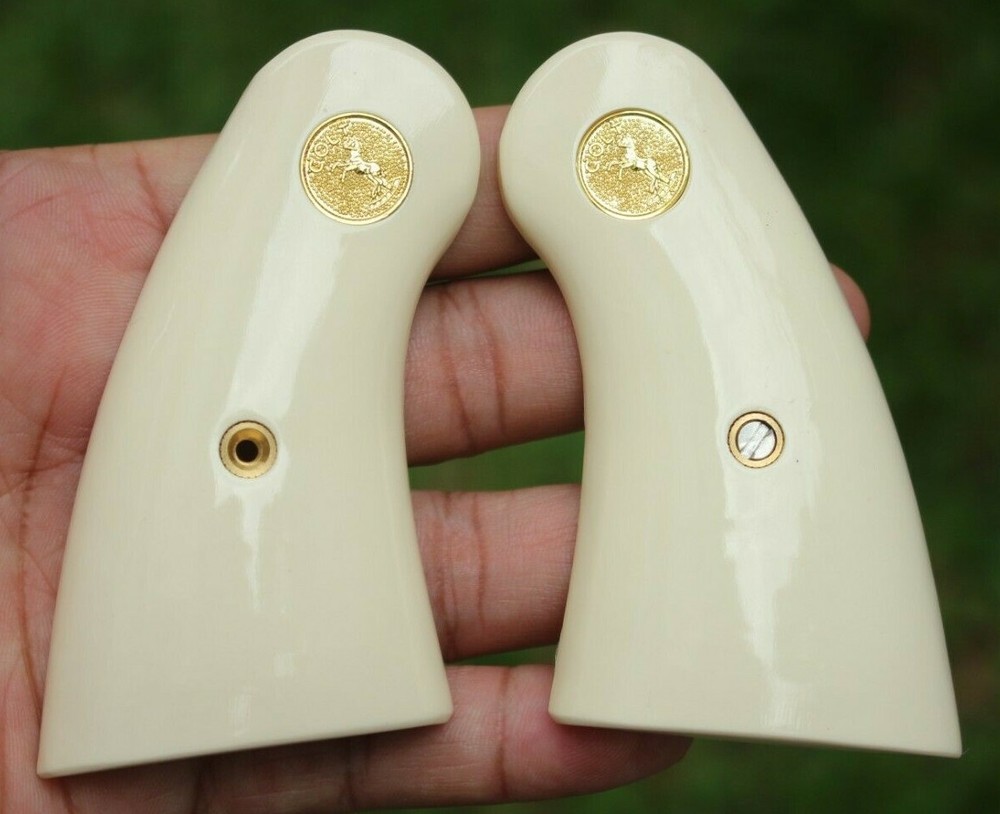 RESIN IVORY GRIPS FOR COLT PYTHON , OFFICIAL POLICE, I E FRAME # GOLD MED