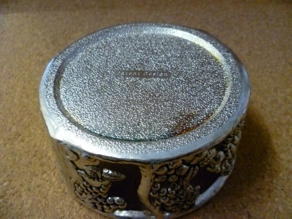 VINTAGE, GALLERIED FRUIT & GRAPEVINE PATTERNED SILVER PLATED WINE BOTTLE STAND.