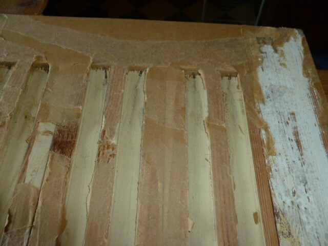 Pine cupboard door in frame. Antique old reclaim, corner.